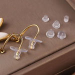 MAYCREATE Earring Backs for Studs featuring 600 pcs clear silicone clutch stoppers | DIY jewelry making accessories